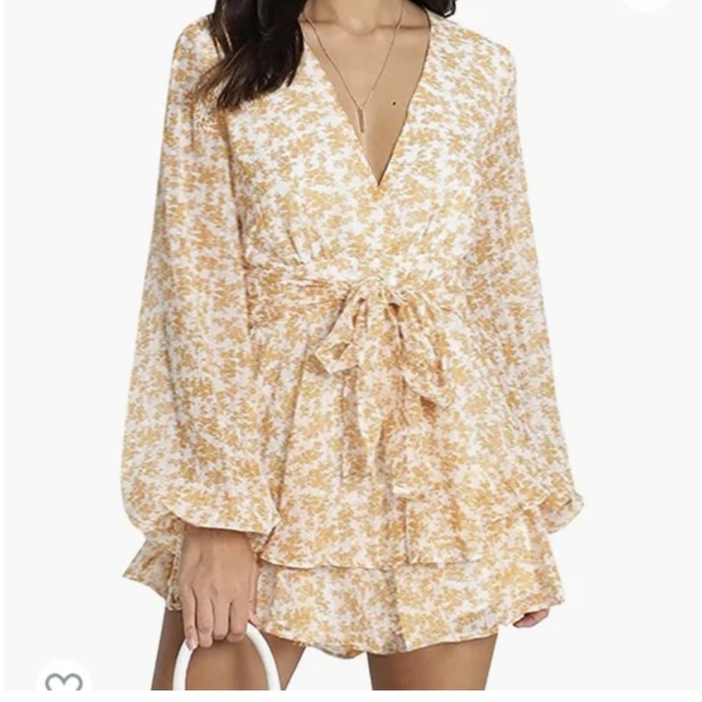 Never worn, yellow floral romper! Perfect for spring/summer!